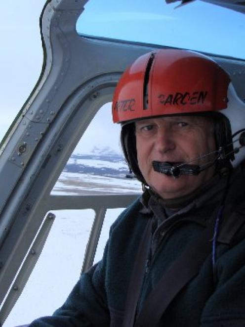 Peter Garden, flying above Rat Island, in the Aleutian Islands, on rat eradication work.
