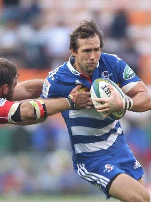 Peter Grant of the Stormers makes a break against the Lions. Photo Getty Images