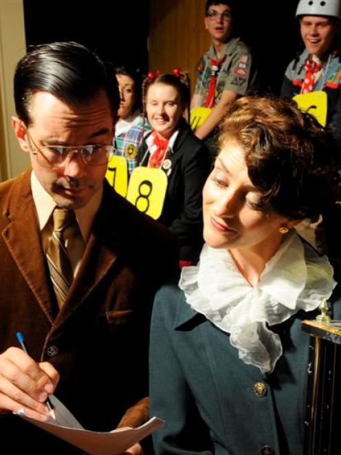 Peter Hocking and Charlotte McKay check results at a Musical Theatre Dunedin rehearsal last night...