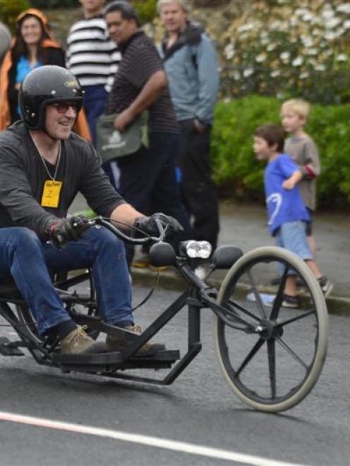Peter King (left) scoots away in Saturday's trolley derby in Dunedin. Photo by Peter McIntosh.