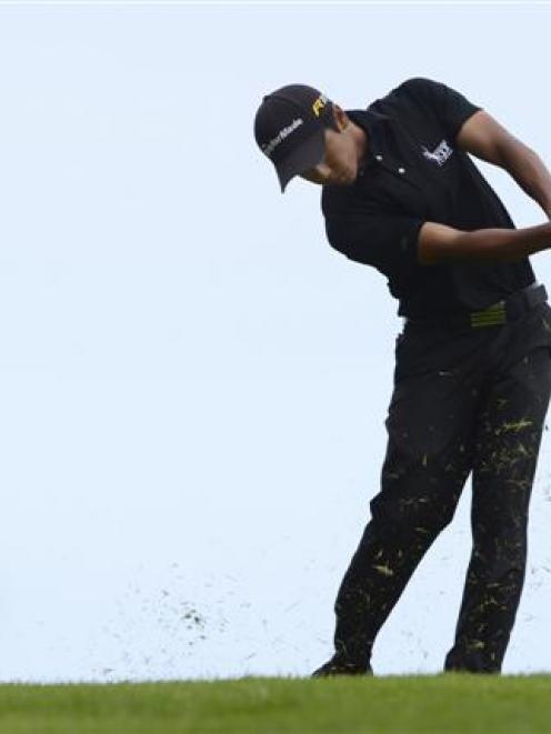 Peter Lee, of Rotorua, plays an approach shot during the South Island strokeplay championship at...