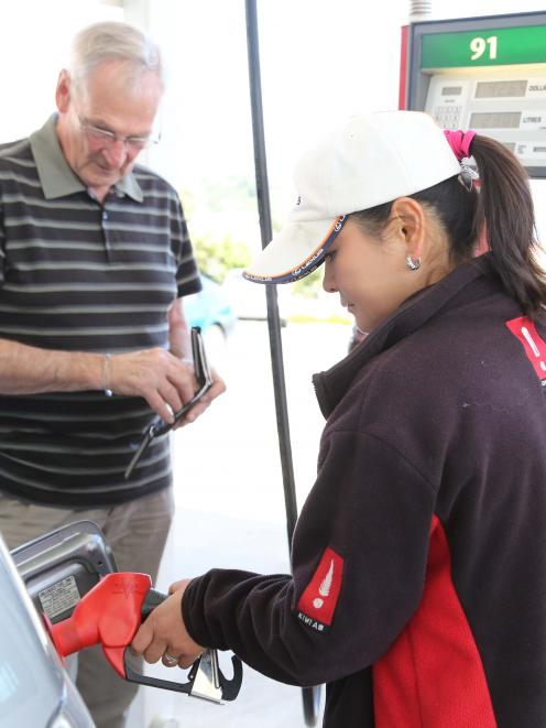 John Jillett, of Dunedin, is served by Alice Chang at Challenge Andersons Bay. Inset: Queenstown...