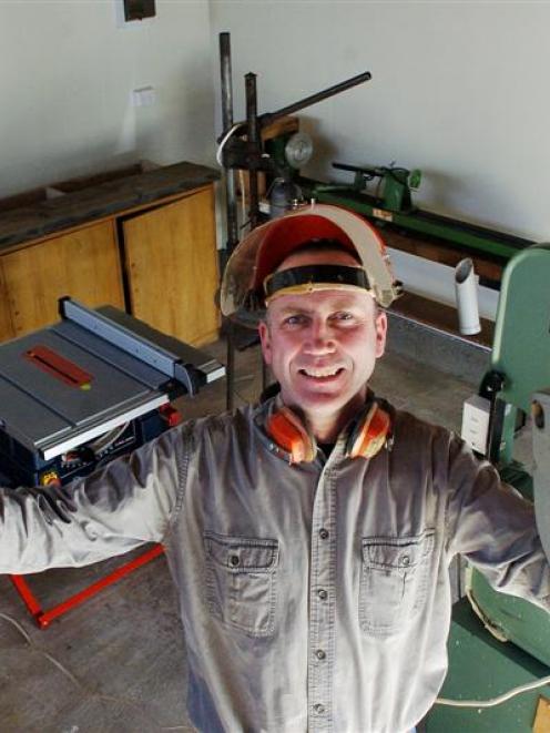 Phil Bradshaw gets to grip with the Dunedin Blokes' Shed in Bay View Rd. Photo by Gerard O'Brien.