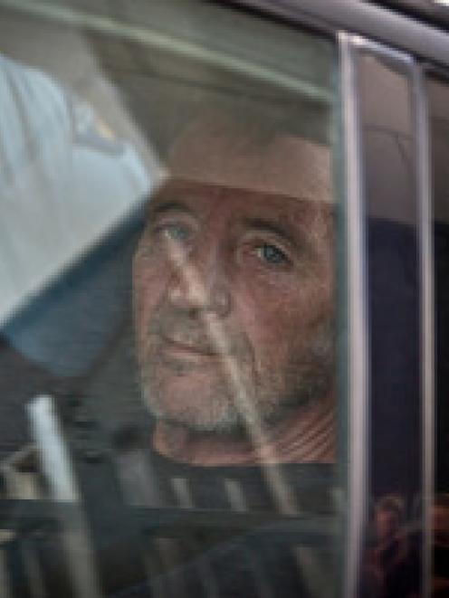 Phil Rudd arrives at the Tauranga Police Station after being detained by police near Tauranga...