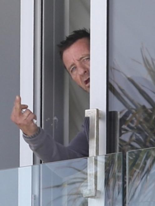 Phil Rudd wasn't talking to reporters gathered outside his Tauranga house yesterday. Photo / NZME.