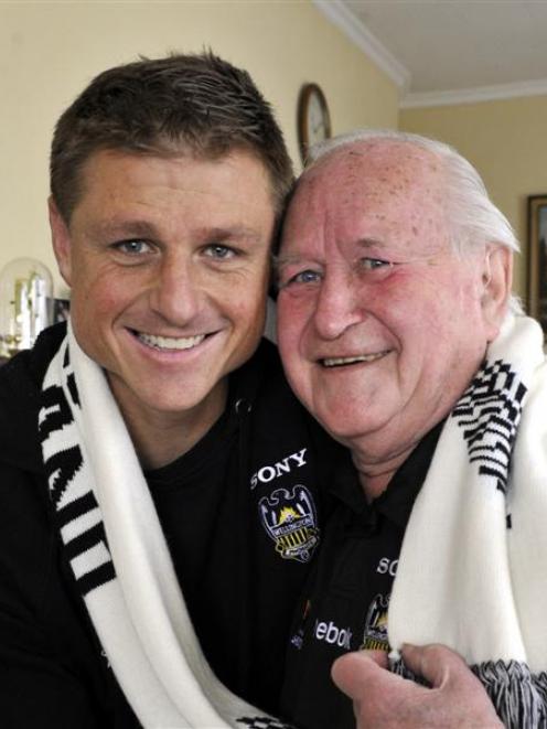 Phoenix and All Whites defender Ben Sigmund catches up with grandfather Jerry Sigmund yesterday....