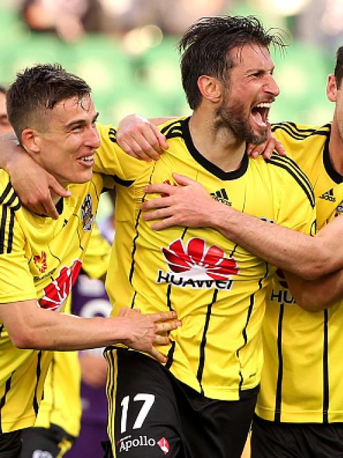 Phoenix players celebrate a goal against Perth at the weekend. Photo Getty