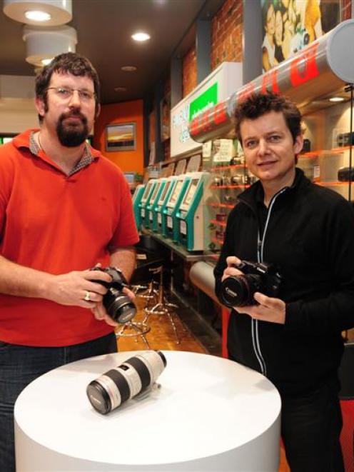 Photo Warehouse southern regional manager Howard Grazier (left) with former business owner...