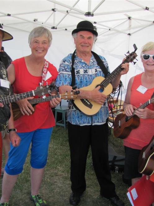 Pic’n’Mix, of Invercargill, tunes up for its performance at the Lauder Ukulele Festival yesterday...