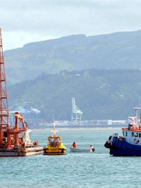 Piles are set into the seabed near the Otakou wharf on Wednesday by Port Otago's pile driver...