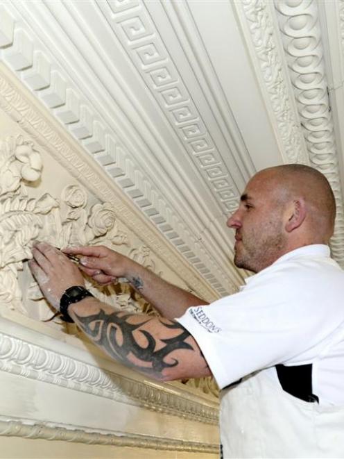 Plasterer Dave Wenlock works restoring the plasterwork at the new Duke of Wellington premises in...