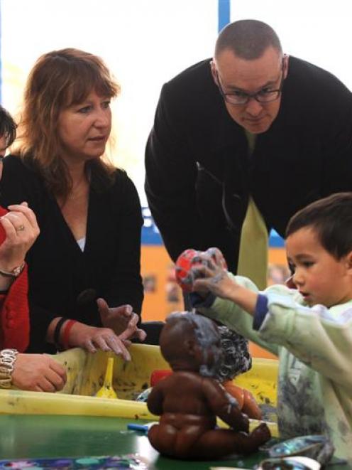 Playing during a visit to Mornington Playcentre in Dunedin yesterday are (from left) Labour...