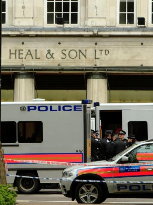 Police and emergency vehicles attend a siege in Tottenham Court Rd in central London. REUTERS...