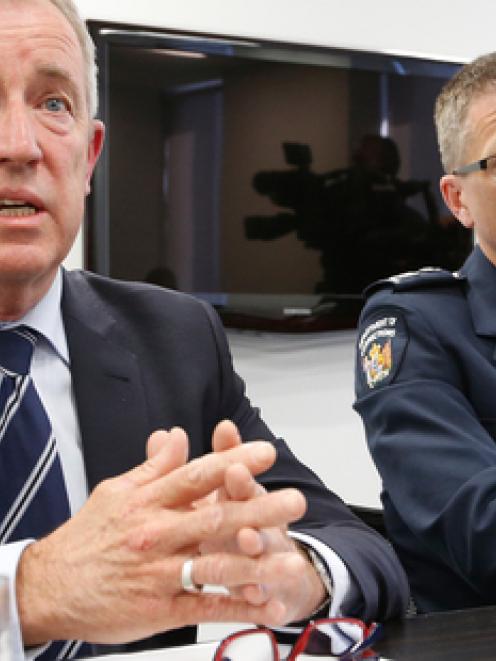 Police Assistant Commssioner Malcolm Bugess (left) and Correction's National Commissioner Jeremy...