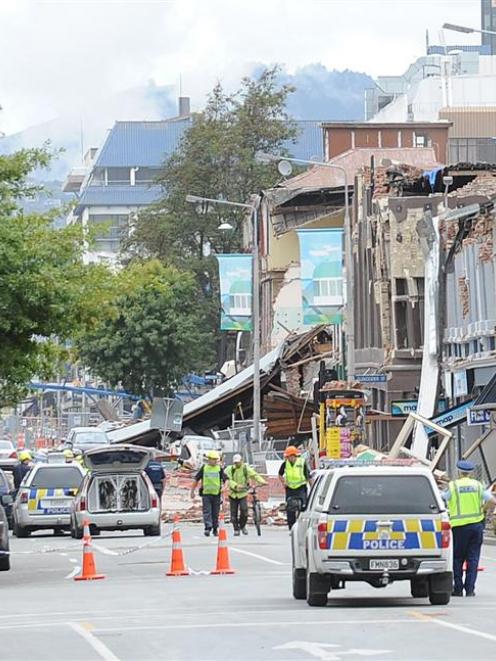 Police cordon off damaged buildings in Christchurch. Photo by Peter McIntosh.