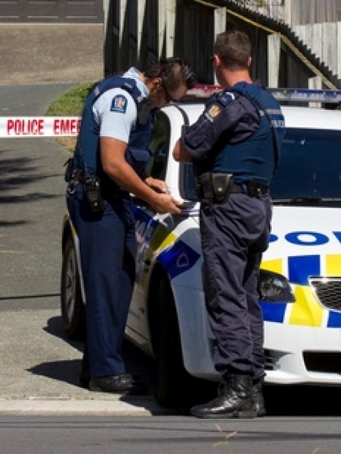 Police cordoned off the area around the driveway in which 18-month-old Mila Tamihana was fatally...