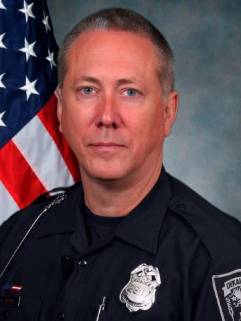 Police officer Robert Olsen has been placed on administrative leave following the shooting....