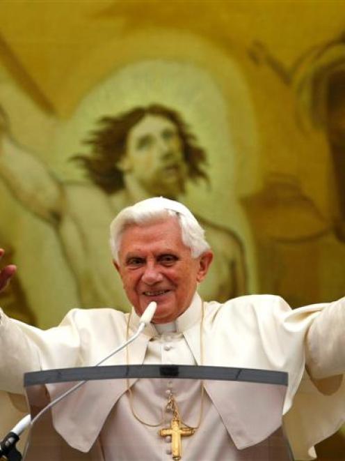 Pope Benedict XVI celebrates the Regina Coeli prayer from the window of his summer residence of...