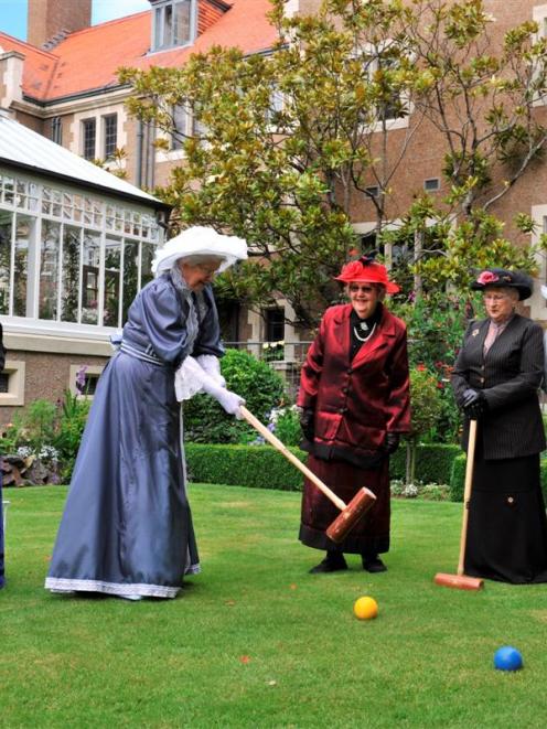 Practising croquet yesterday  for this weekend's Olveston Edwardian garden party are (from left)...