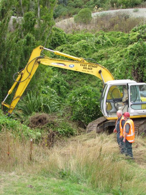 Preparatory work started yesterday investigating how to reinstate Haven St in to Moeraki. Digger...