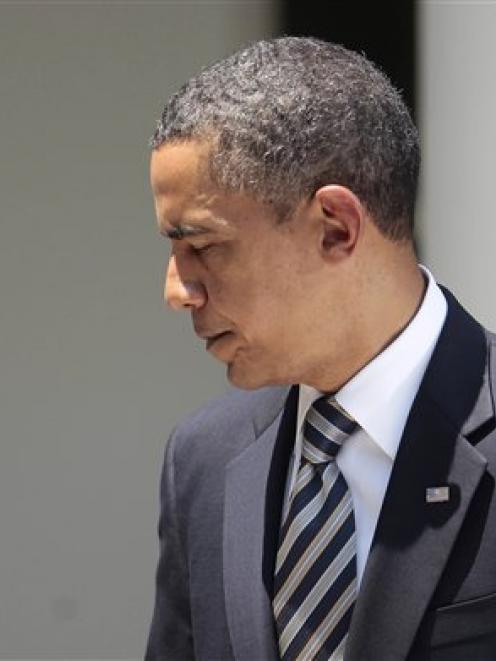 President Barack Obama walks away after delivering a statement in the Rose Garden of the White...