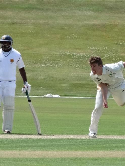 President's XI bowler Blair Tickner delivers a ball at the Queenstown Events Centre yesterday...