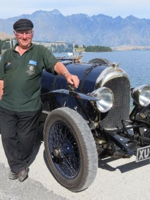 Pride and joy . . . Bentley Drivers' Club member Roy Partridge, of England, stands beside his...