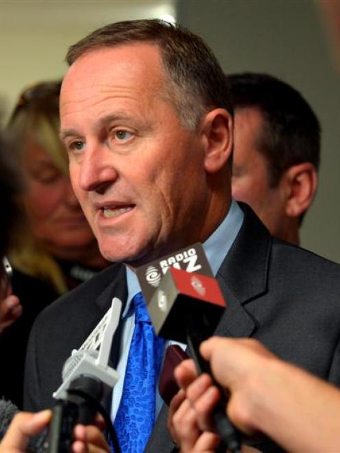 Prime Minister John Key answers questions during his  Dunedin visit yesterday. Photo by Gerard O...