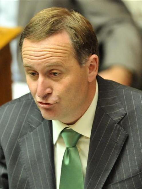 Prime Minister John Key, in the debating chamber for the question time of the new government in...