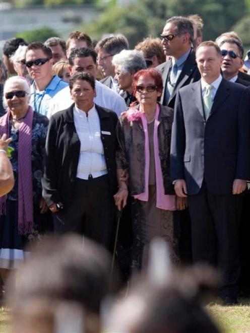 Prime Minister John Key is accompanied on to Te Tii marae by Ngapuhi elder Titewhai Harawira ...
