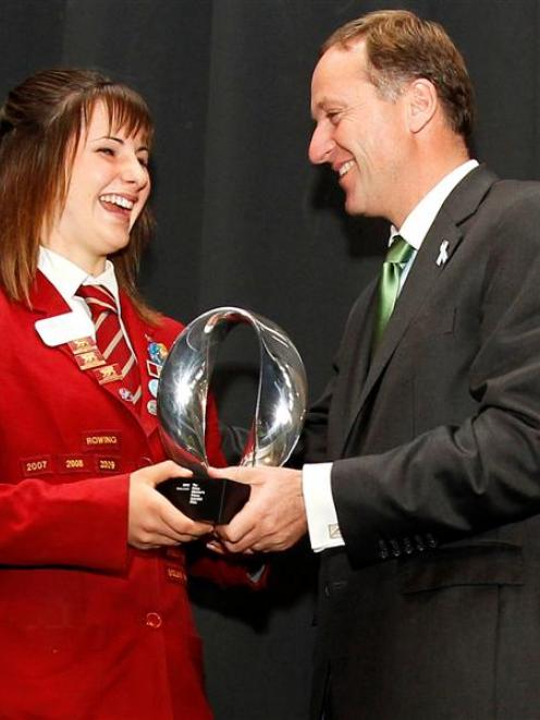 Prime Minister John Key presents the Future Scientist Prize  to  James Hargest College pupil...