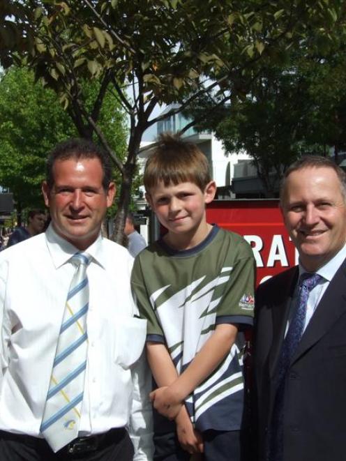 Prime Minister John Key (right) meets Cody Campbell (8), a pupil at Remarkables Primary School...