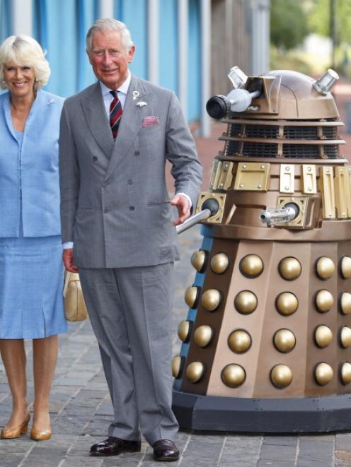 Prince Charles and Camilla, Duchess of Cornwall pose with a Dalek on the Doctor Who set at BBC...