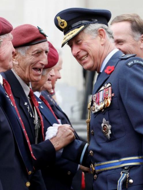 Prince Charles greets a returned soldier as he attends the Armistice Day Commemoration at the...