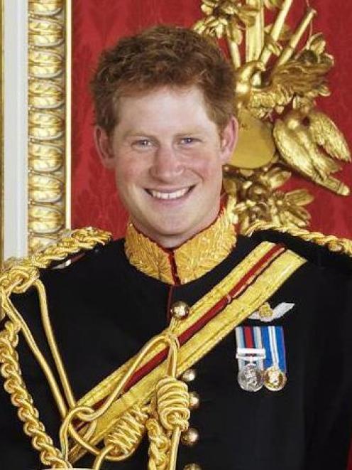 Prince Harry lived up to his larrikin expectation. Photo by AP