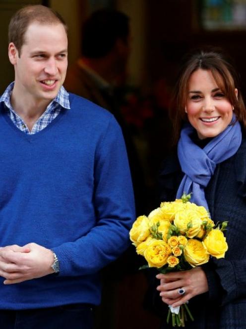 Prince William leaves the King Edward VII hospital in London with his wife Catherine, Duchess of...