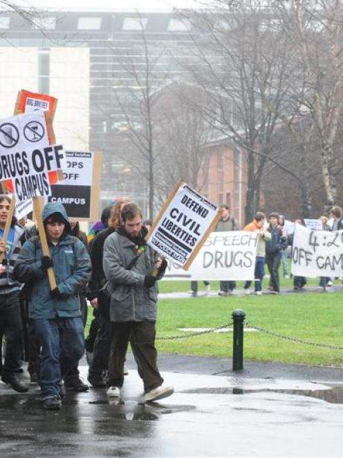 Pro Norml protesters and anti Norml protesters march on the University of Otago campus yesterday....
