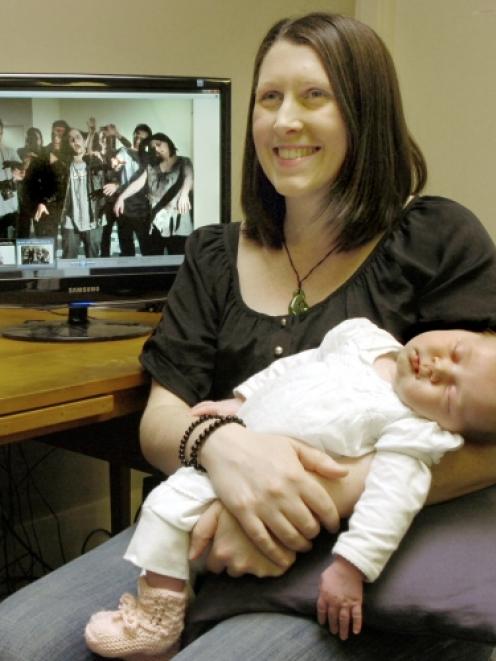 Producer Zoe Hobson and her 4-week-old daughter, Abigail, in Dunedin yesterday. Abigail will have...