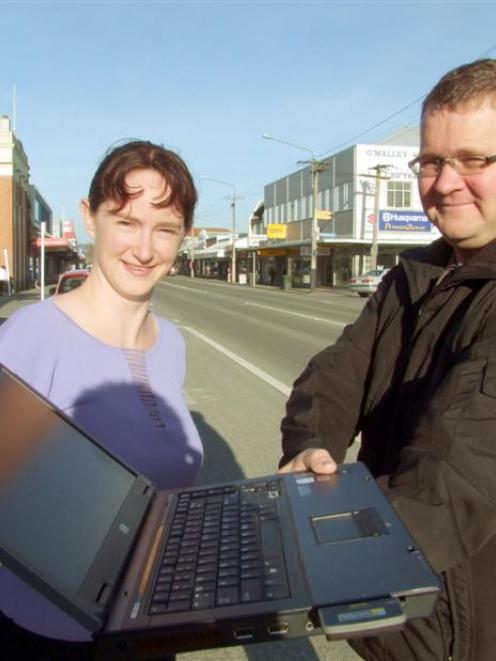 Project Clutha chairwoman Donna Carline and Rivernet computer technician Glenn Hutton check...