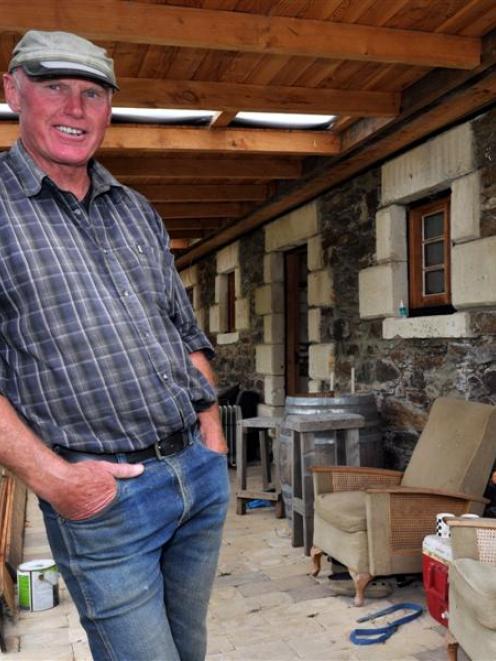 Puketapu Timber owner Chris Cox outside his latest ambitious restoration project. Photo by Gregor...
