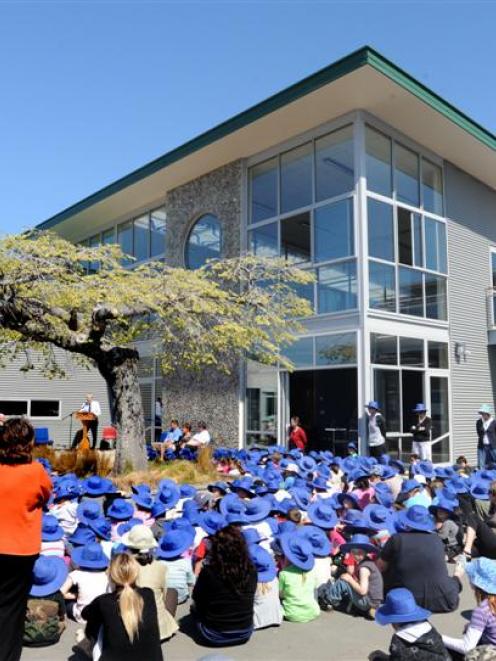 Pupils and parents attend the opening of St Clair School's new building yesterday. Photos by...