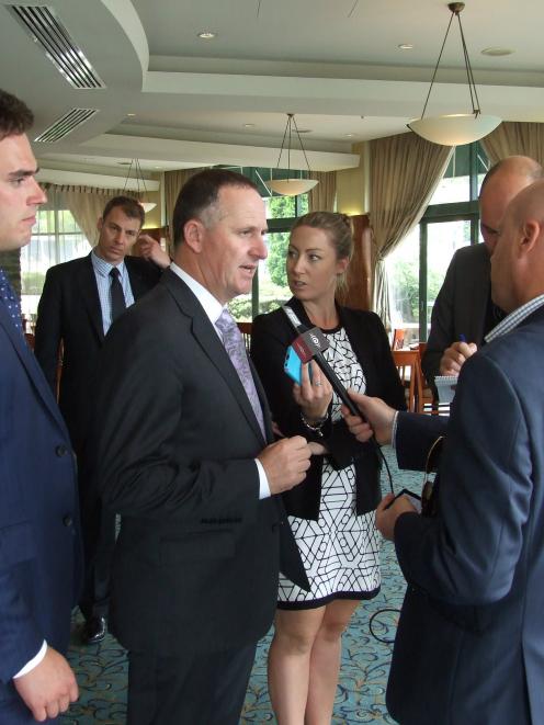 Prime Minister John Key speaks to the media after a DestinationQueenstown lunch function...