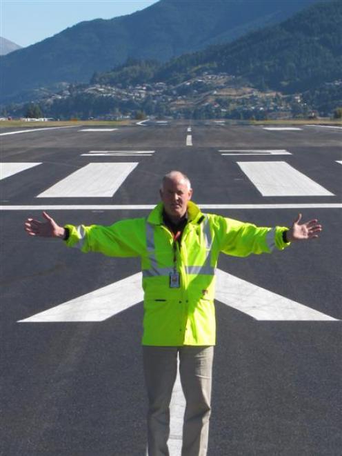 Queenstown Airport manager Chris Read stands on the newly resealed runway at the airport...