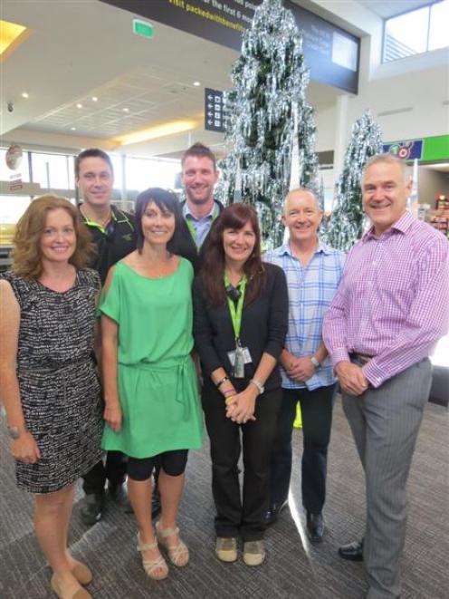Queenstown Airport staff (from left) terminal  operations manager Aideen Tinney, with Daniel Dodd...