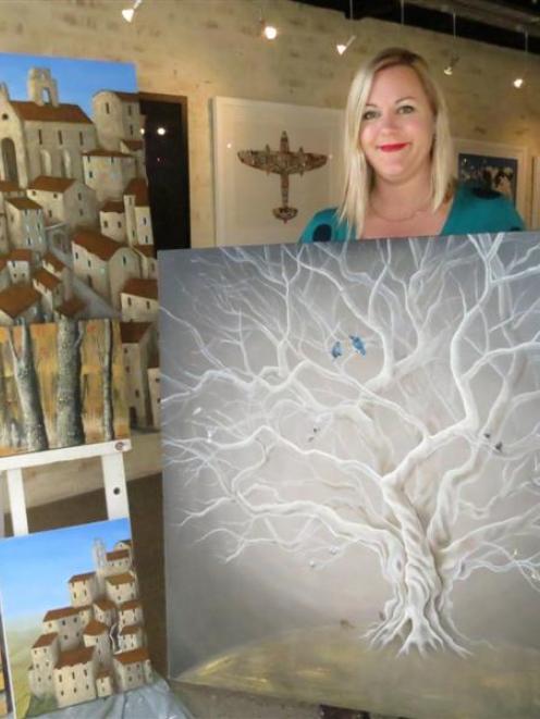 Queenstown artist Rachael Errington with her piece, The Peaceful Place, which will be offered by...