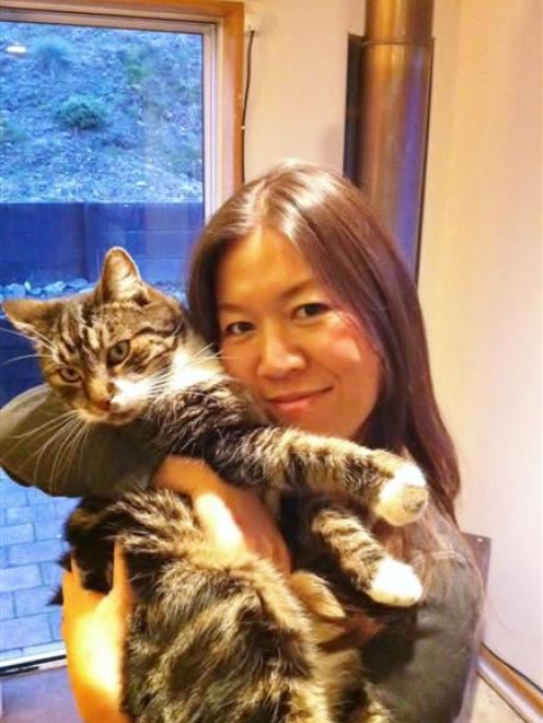 Queenstown Cat Rescue trustee Mayumi Rowcroft holds her cat, Troy. Photo supplied.