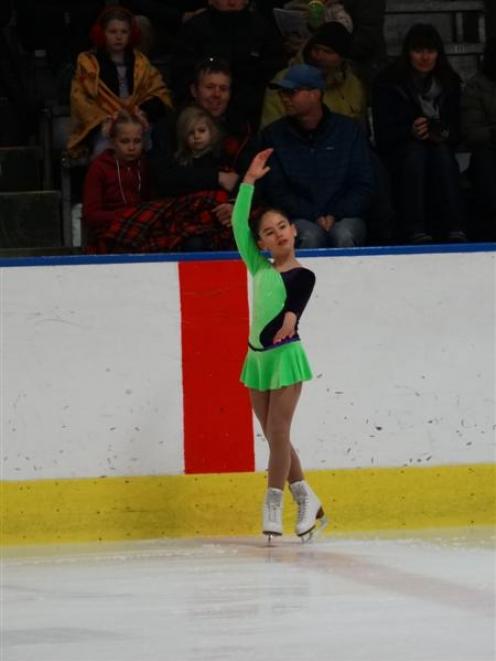 Queenstown Ice Skating Club member Manuella Garcia (7), of Frankton, performs her routine in the...