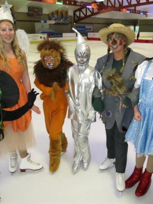 Queenstown Ice Skating Club members (from left) Loris Mills, as the Wicked Witch, India Haworth ...