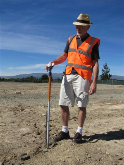 Queenstown Lakes District Council capital works manager Ken Gousmett inspects a  spray nozzle...