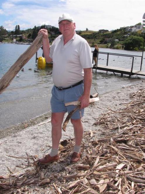 Queenstown Lakes harbourmaster Marty Black stands on the shore of Lake Wanaka yesterday with...